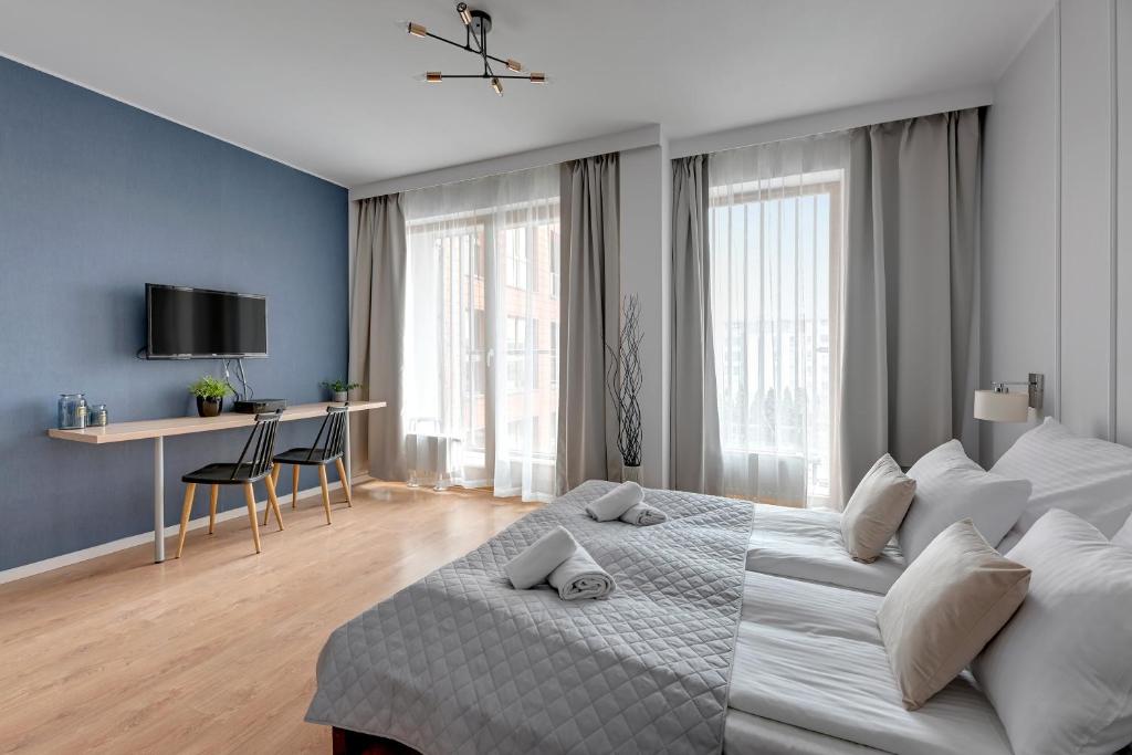 Apartamenty Apartinfo Aura - 阳台和河景（停车位）的工作室公寓