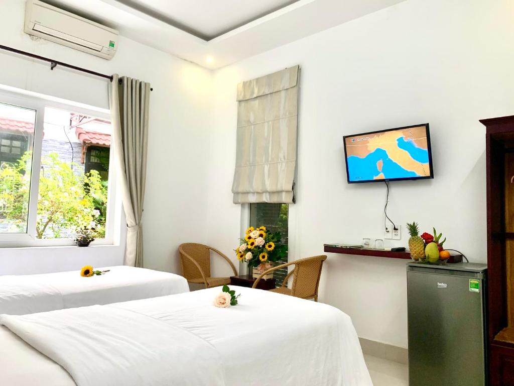 Ngọc Sinh Homestay - 带有城市景观的三重房间