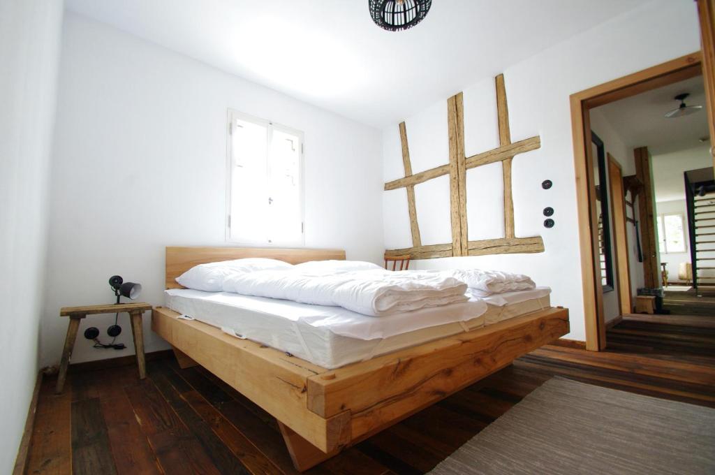 Postel nebo postele na pokoji v ubytování Ochsenhof