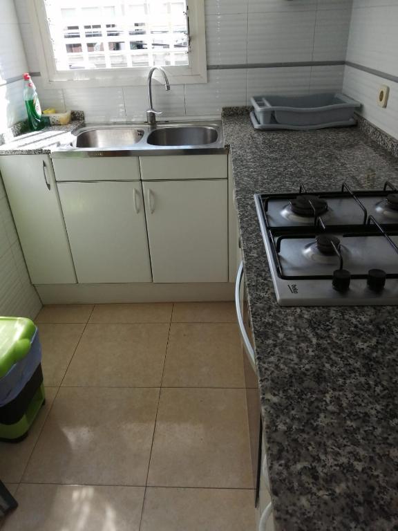 Kuchyň nebo kuchyňský kout v ubytování LG Nice Apartment