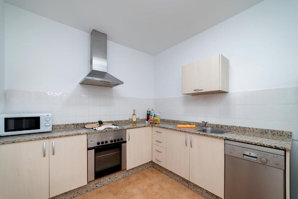 Kuchyň nebo kuchyňský kout v ubytování Villa Casa Mar
