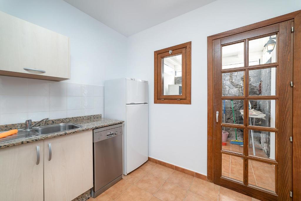 Kuchyň nebo kuchyňský kout v ubytování Villa Casa Mar
