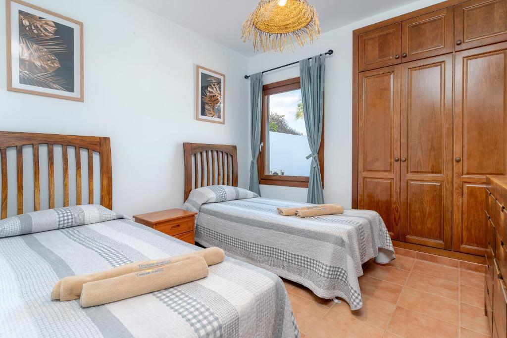 Postel nebo postele na pokoji v ubytování Villa Casa Mar