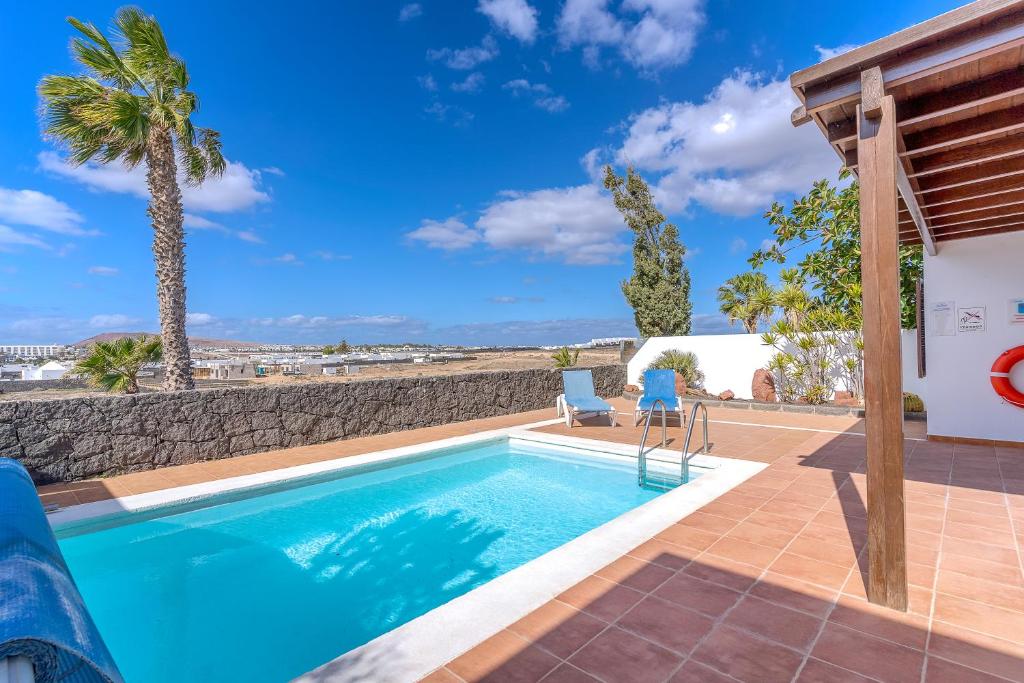 Bazén v ubytování Villa Casa Mar nebo v jeho okolí