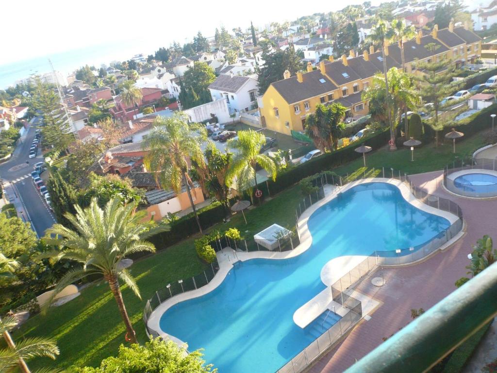 Výhled na bazén z ubytování Excellent apartment in Marbella nebo okolí