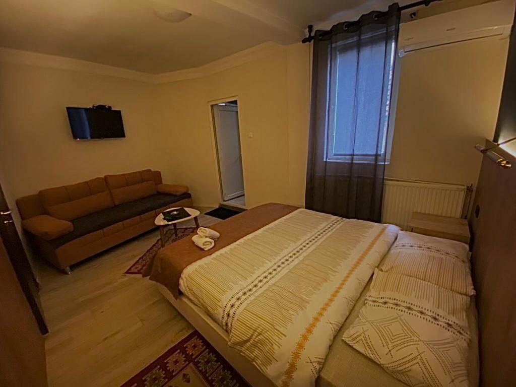 Postel nebo postele na pokoji v ubytování Hotel Lido
