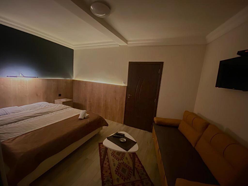 Postel nebo postele na pokoji v ubytování Hotel Lido