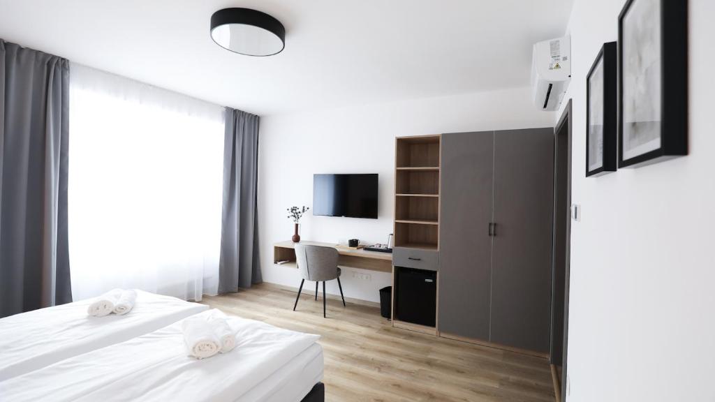 TV a/nebo společenská místnost v ubytování Dubno Eat & Sleep