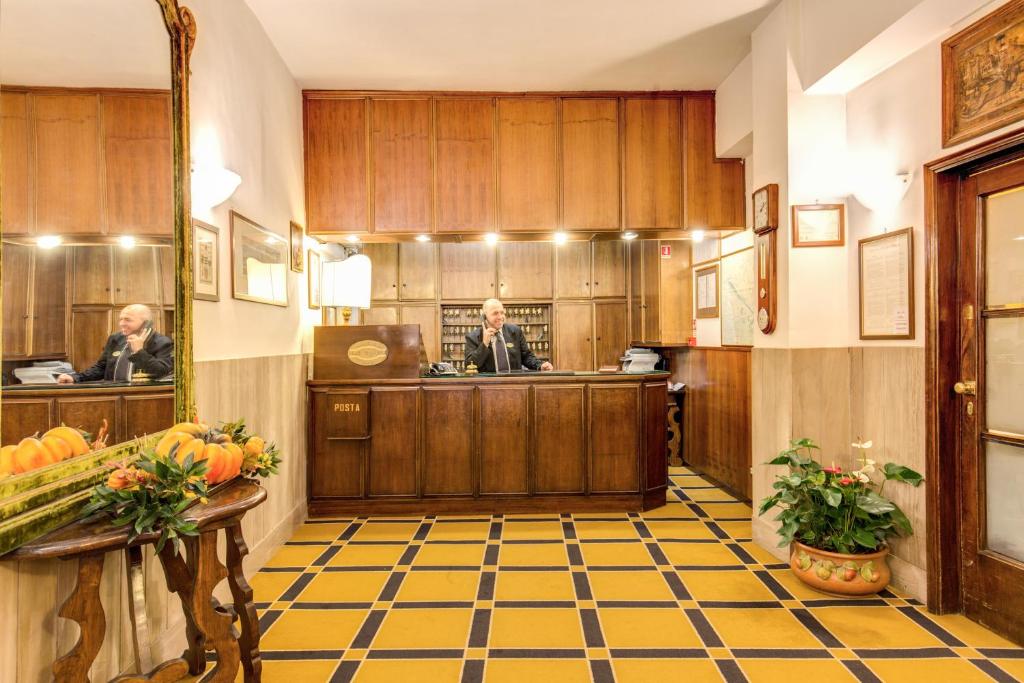 A kitchen or kitchenette at Hotel S.Giorgio & Olimpic