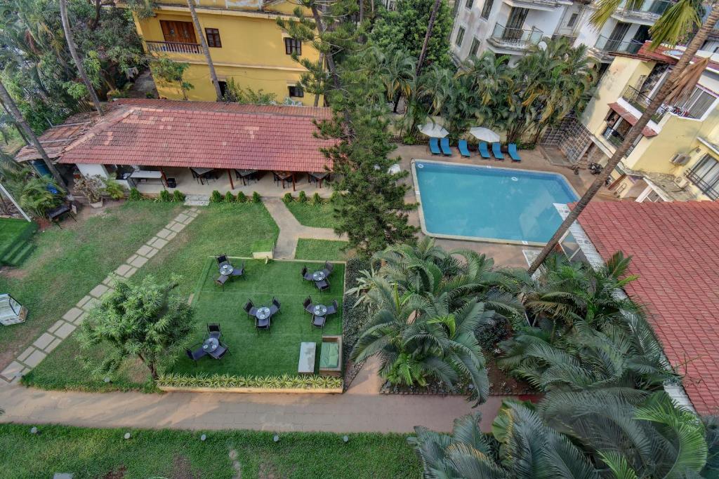 an aerial view of a backyard with a swimming pool at Peninsula Beach Resort in Calangute