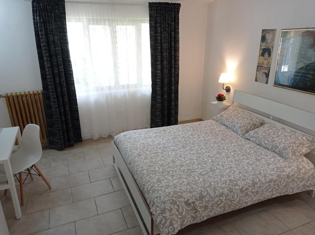 Łóżko lub łóżka w pokoju w obiekcie Gli Archi Country Home