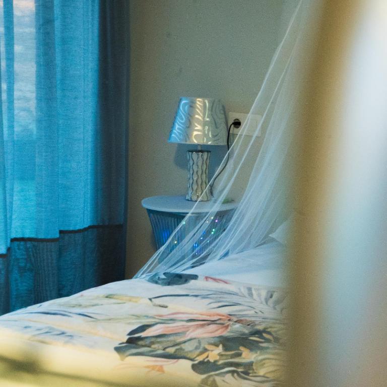 Postel nebo postele na pokoji v ubytování Cabezo Buñuel alojamiento Rural
