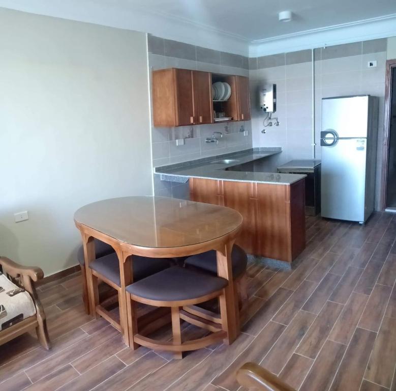 Kuchyň nebo kuchyňský kout v ubytování L’amour Hotel apartment