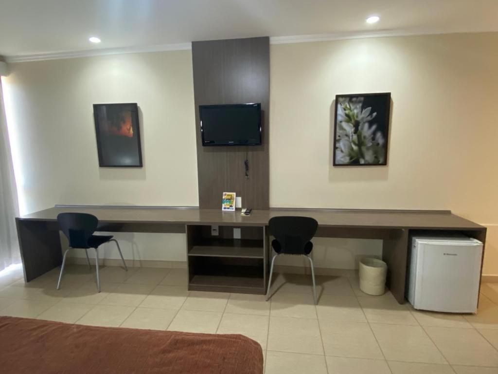 Posezení v ubytování Class Hotel Passos Rio Grande Portal da Canastra