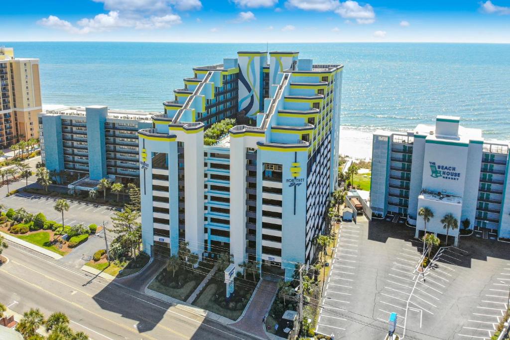 an aerial view of a building near the ocean at Monterey Bay Suites in Myrtle Beach