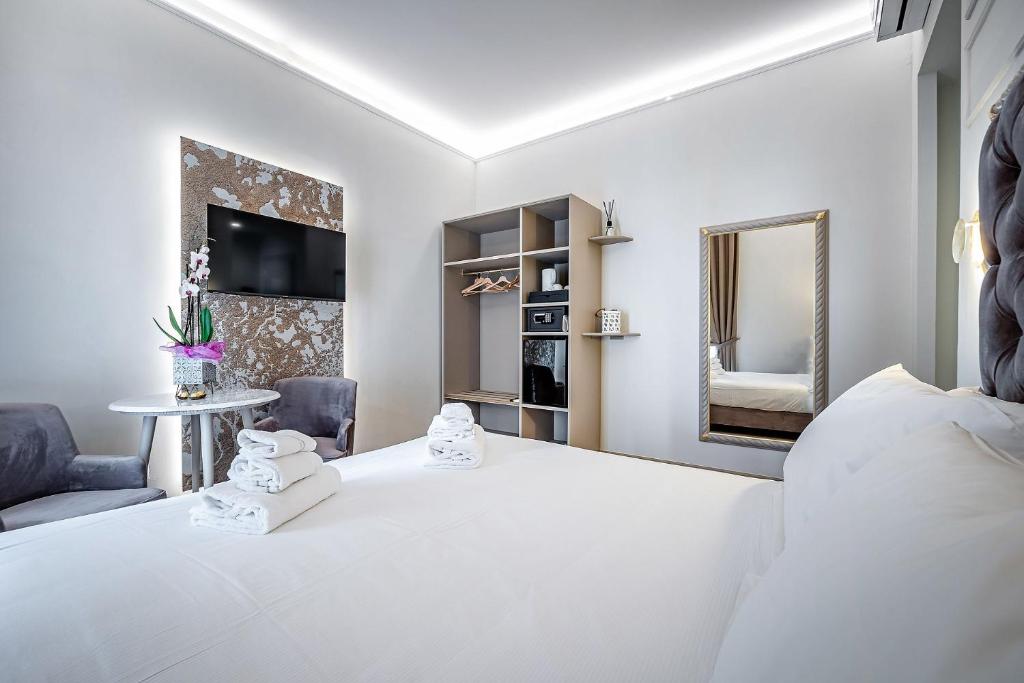 A bed or beds in a room at Residenza Giotto