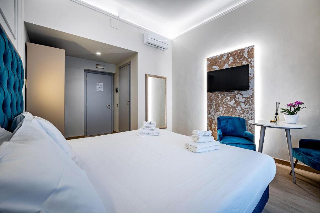A bed or beds in a room at Residenza Giotto