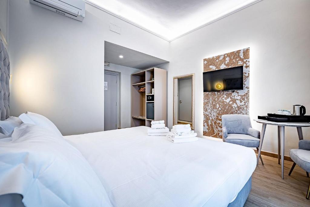 A bed or beds in a room at Residenza Giotto
