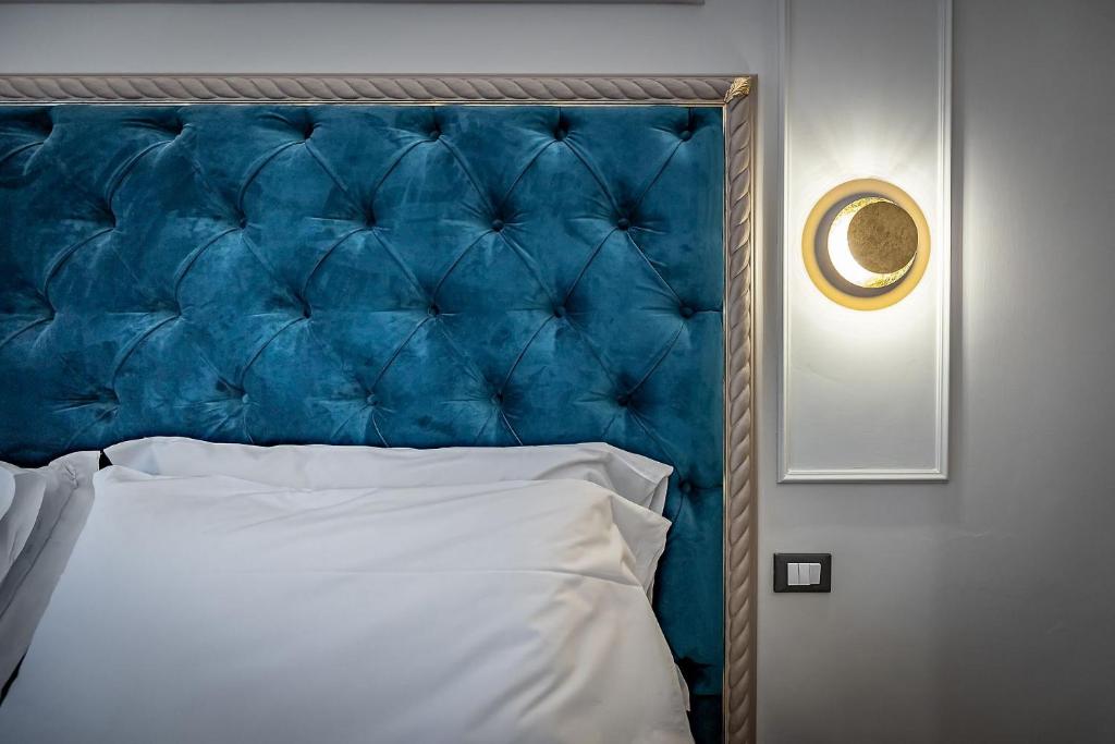 A bed or beds in a room at Residenza Giotto