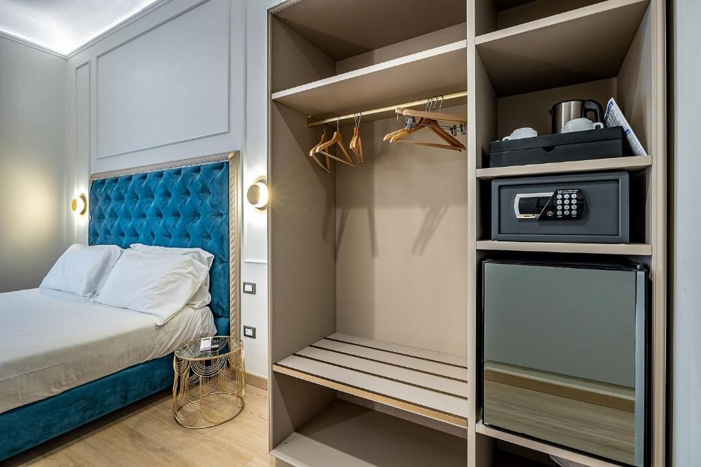 A bed or beds in a room at Residenza Giotto