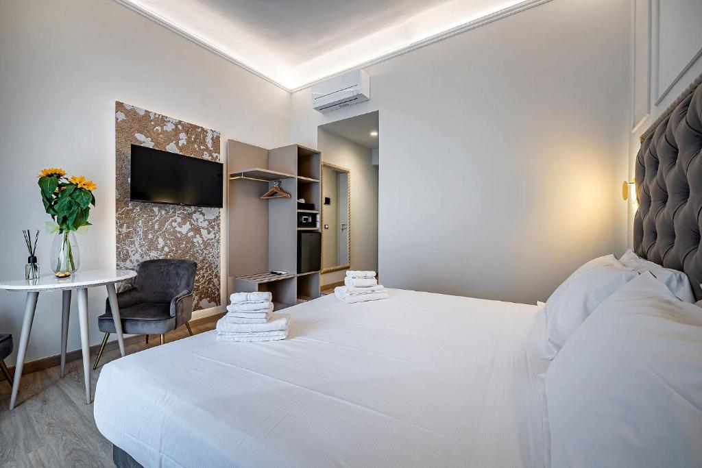 A bed or beds in a room at Residenza Giotto