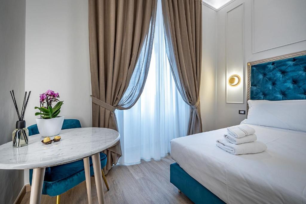A bed or beds in a room at Residenza Giotto