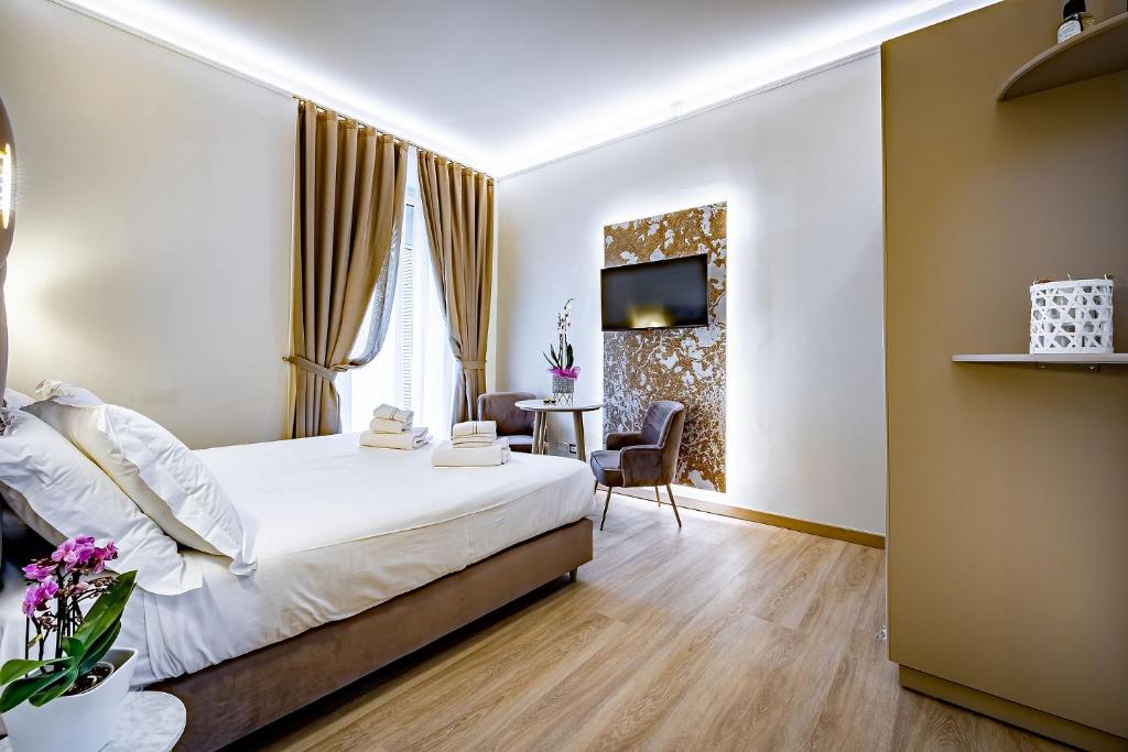 A bed or beds in a room at Residenza Giotto