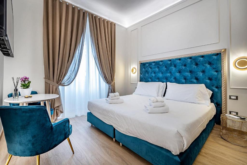 A bed or beds in a room at Residenza Giotto