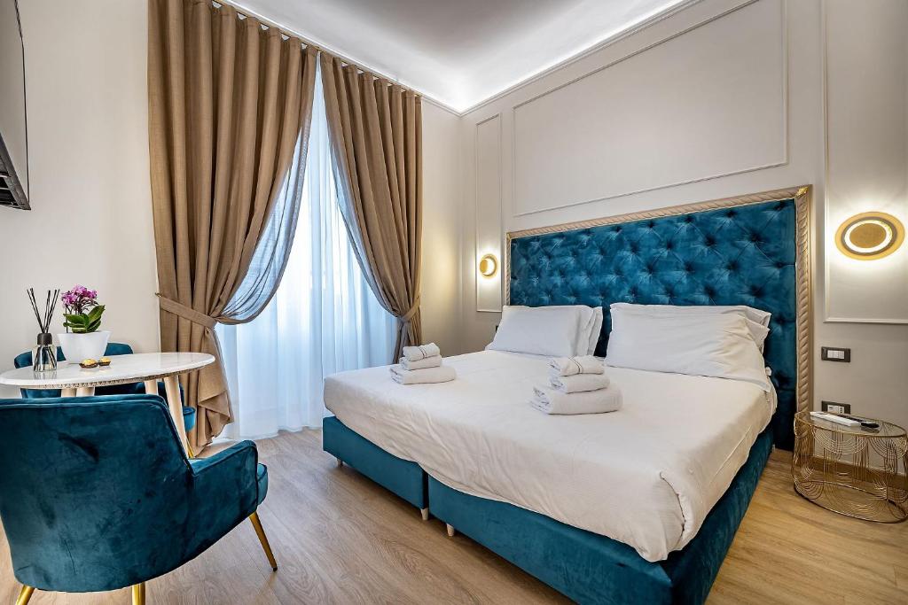 A bed or beds in a room at Residenza Giotto
