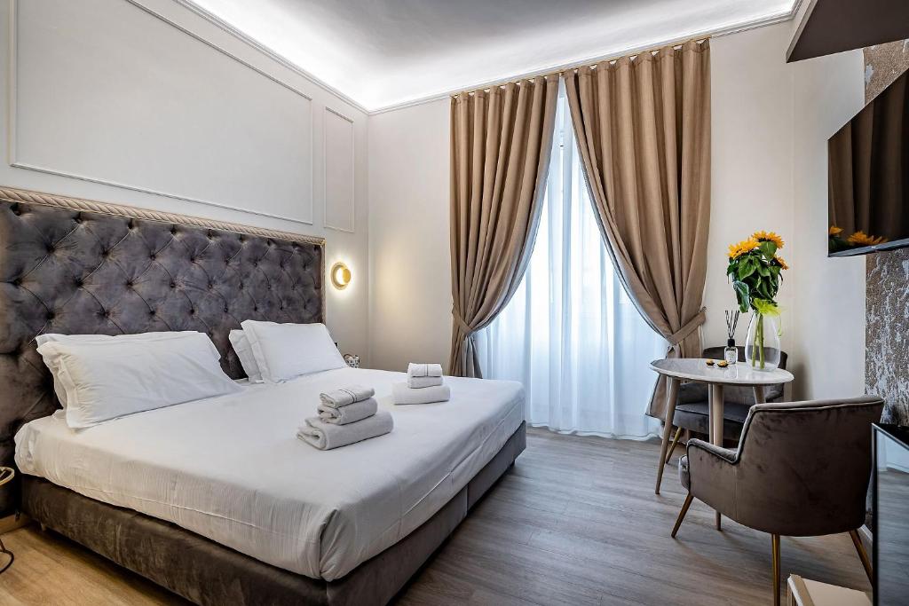 A bed or beds in a room at Residenza Giotto