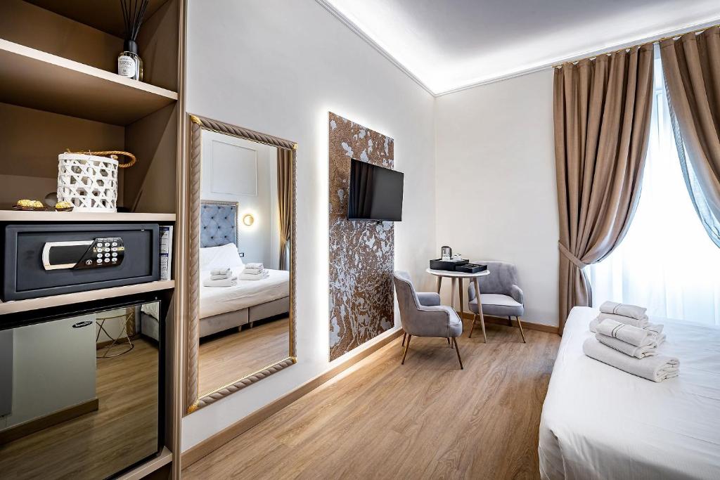 A bed or beds in a room at Residenza Giotto