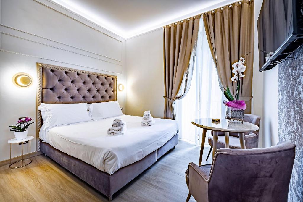A bed or beds in a room at Residenza Giotto