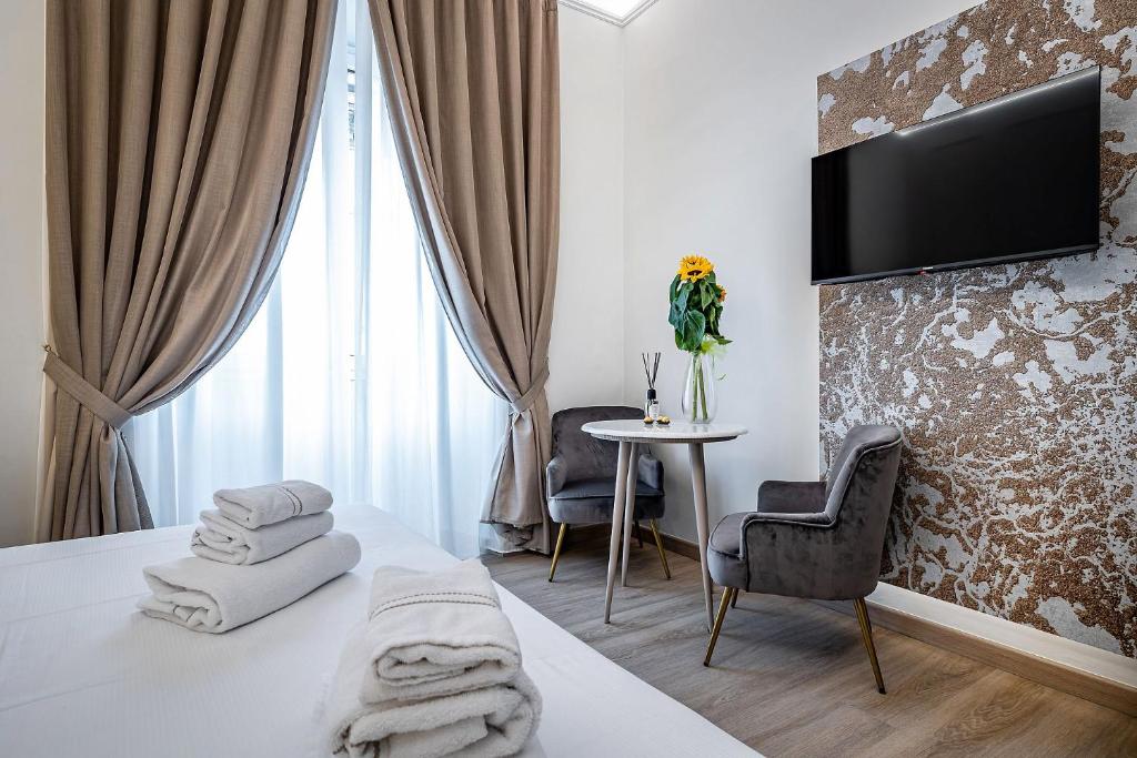 A television and/or entertainment centre at Residenza Giotto