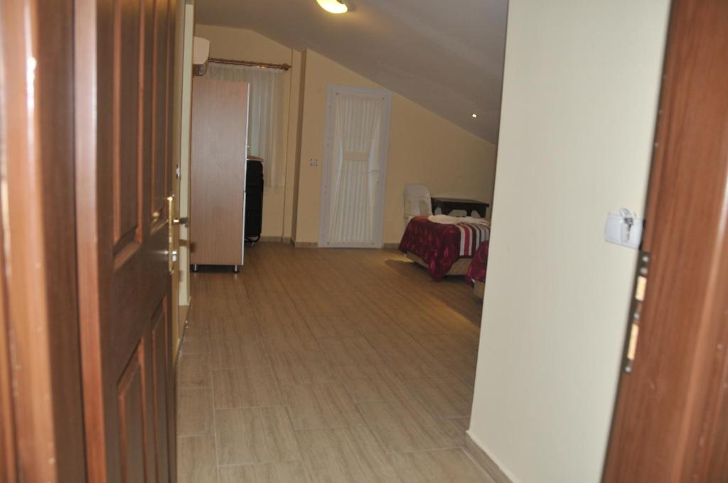 Postel nebo postele na pokoji v ubytování Tolay Hotel