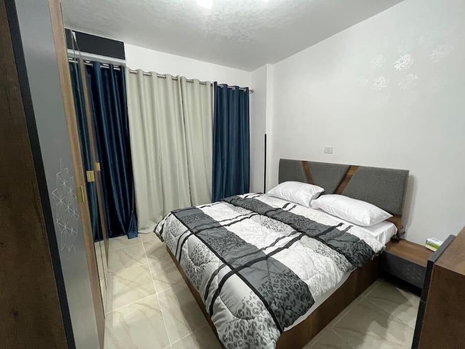 Ένα ή περισσότερα κρεβάτια σε δωμάτιο στο Cheap and Fancy apartment