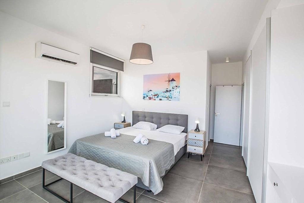 Postel nebo postele na pokoji v ubytování Villa Olivine Pearl 6