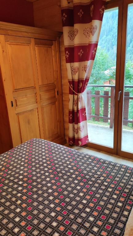 Posteľ alebo postele v izbe v ubytovaní Appartement dans petit chalet