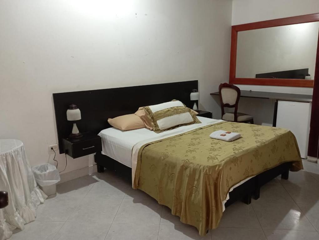 Postel nebo postele na pokoji v ubytování HOTEL COSTA DEL SOL mav