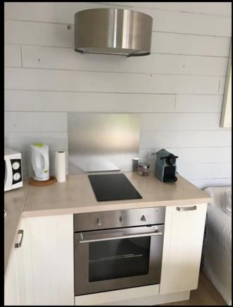 Kuchyň nebo kuchyňský kout v ubytování Petite maison avec jardin au coeur de Pornichet