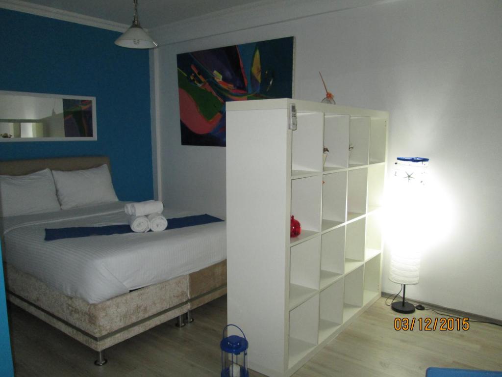 Postel nebo postele na pokoji v ubytování The City Residence Hotel