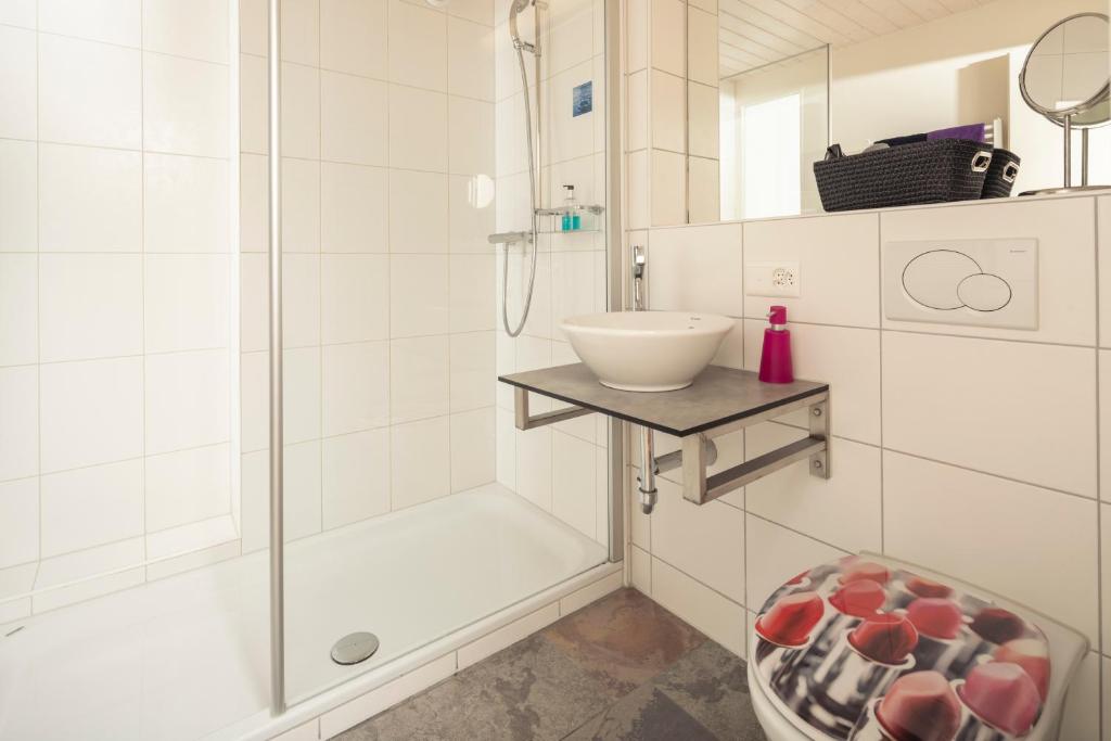 Koupelna v ubytování Alpenkräuter Hotel Bären