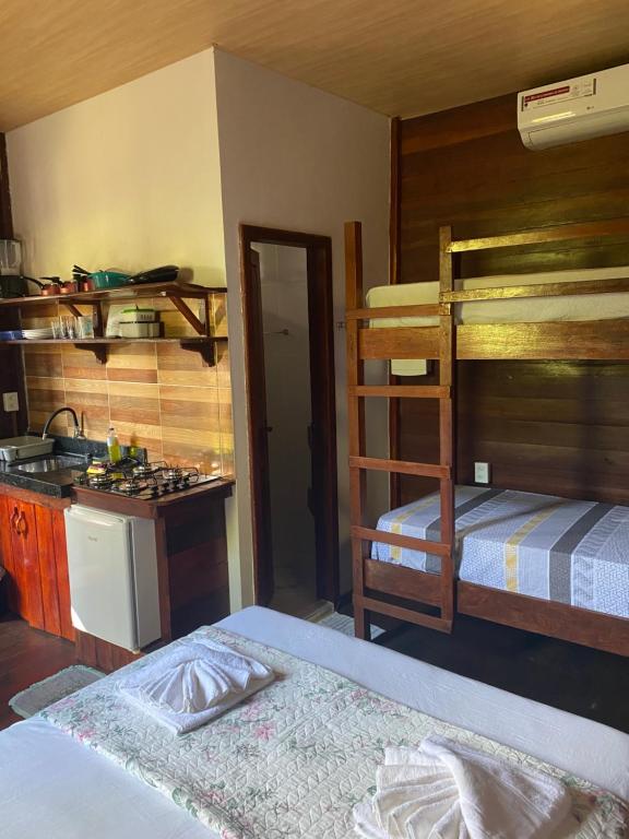 Postel nebo postele na pokoji v ubytování Chalés Paradise