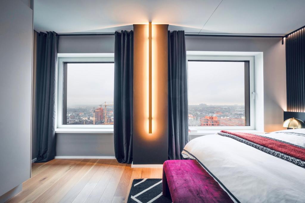 Postel nebo postele na pokoji v ubytování Bohr Apartment Copenhagen