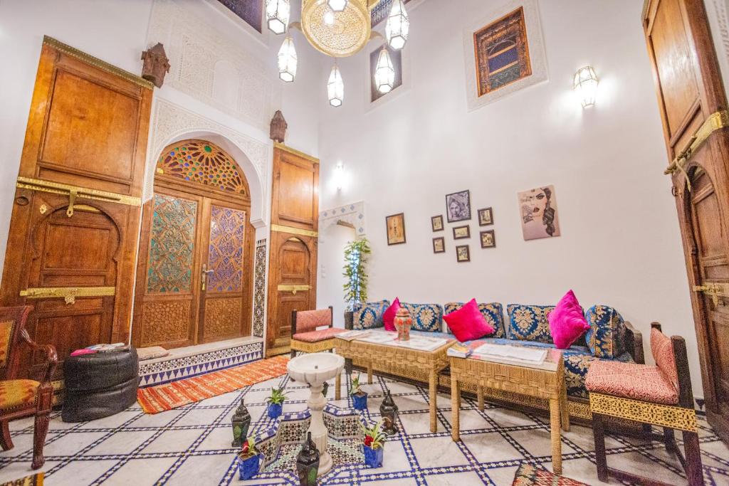 a living room with a couch and a table at Medina Sky in Fez