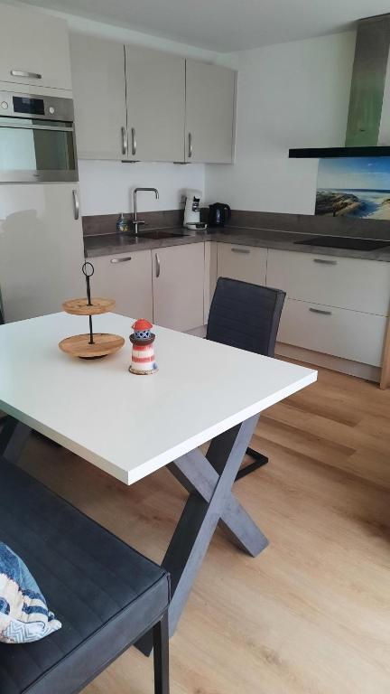 Kuchyň nebo kuchyňský kout v ubytování vakantiewoning zeumeruus