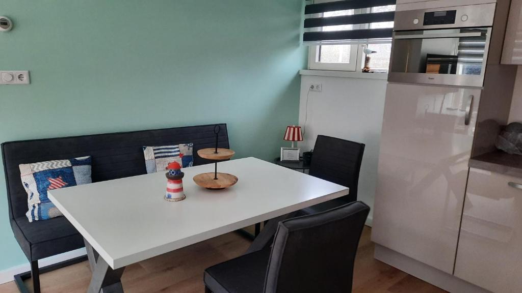 Kuchyň nebo kuchyňský kout v ubytování vakantiewoning zeumeruus