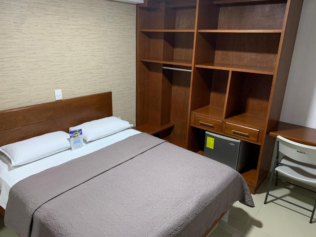 Postel nebo postele na pokoji v ubytování Hotel El Faro Buga