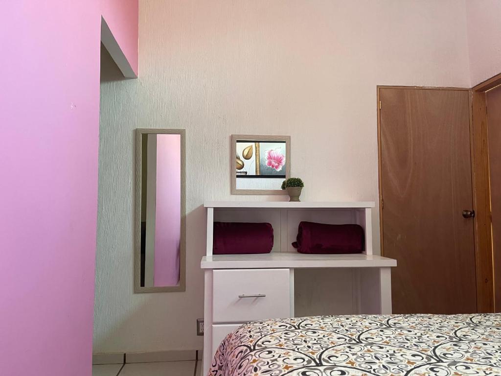 Postel nebo postele na pokoji v ubytování DEPARTAMENTOS ANAHUAC