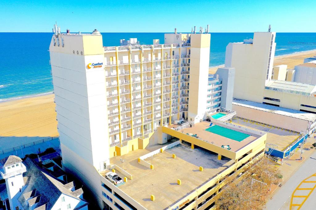 an aerial view of a hotel on the beach at Comfort Suites Beachfront in Virginia Beach