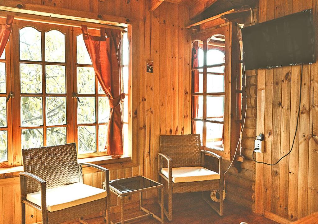 TV a/nebo společenská místnost v ubytování Cabaña Marquesana